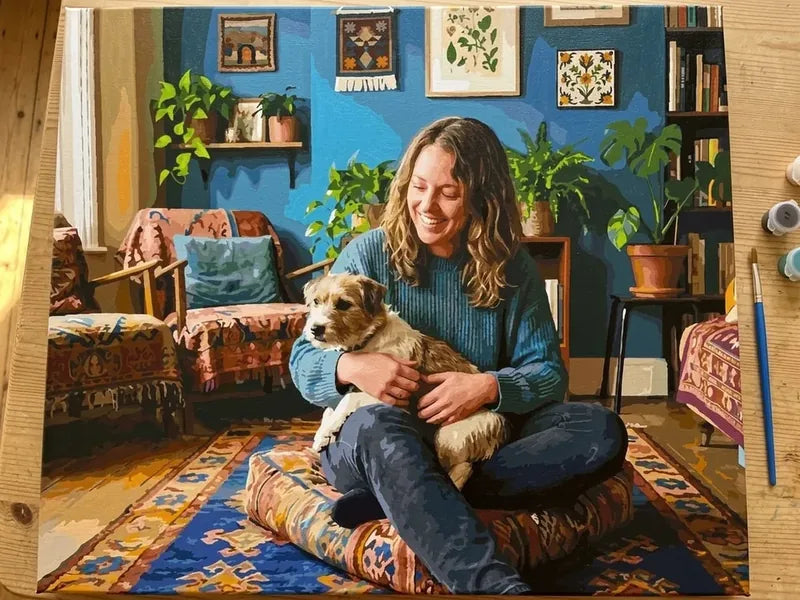 Finished custom paint by numbers of a woman and her dog in a living room