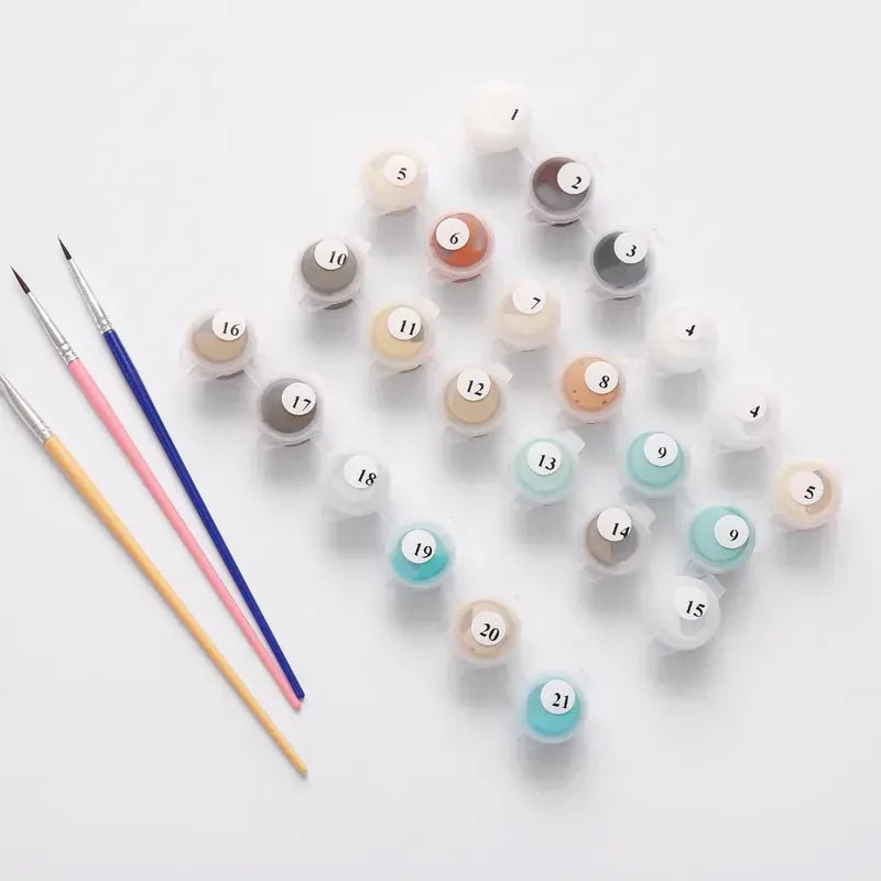 Paint by numbers paint pots and brushes ready to begin