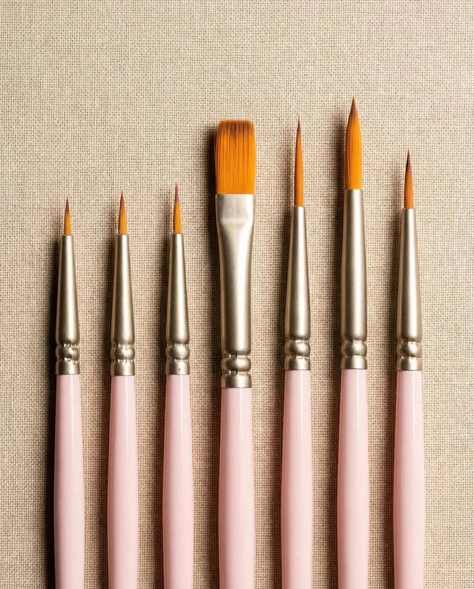 Paint by numbers brush set on a painting desk with canvas background
