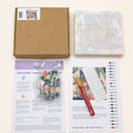Thumbnail for Contents of a framed 20x20 cm paint by numbers kit: paints, brushes, instructions and pre-stretched canvas