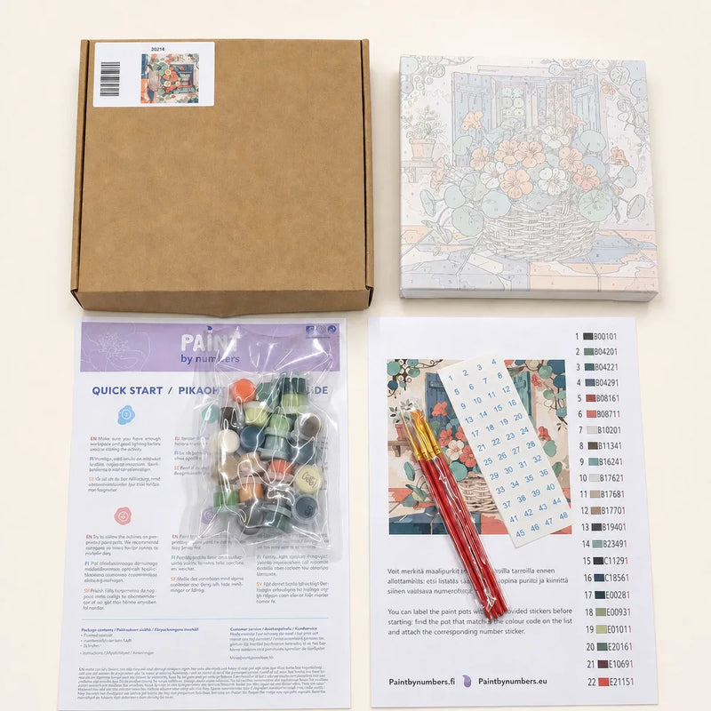 Contents of a framed 20x20 cm paint by numbers kit: paints, brushes, instructions and pre-stretched canvas