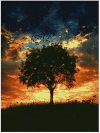Thumbnail for Diamond painting model image: A silhouetted, leafy tree stands on the top of a hill against the sunset. The sky is full of dark clouds framed by a vibrant glow of orange and yellow.