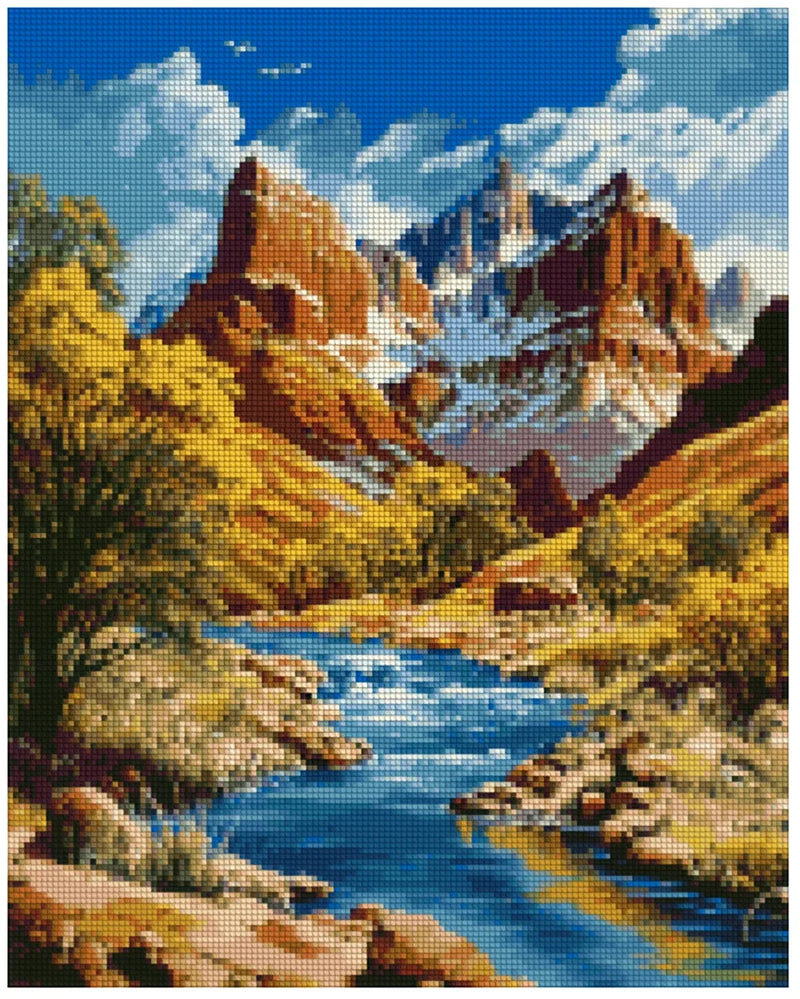 Diamond painting template - bright blue river landscape, reddish-brown mountains, and golden autumn trees under a bright blue sky.