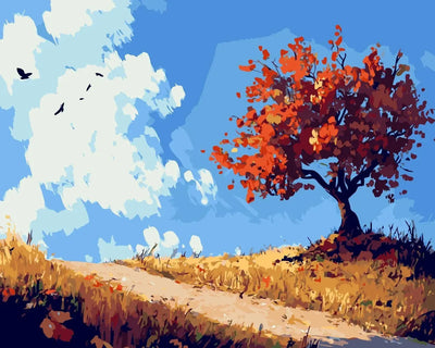 An autumn landscape with a solitary red tree standing on a hill under a bright blue sky.