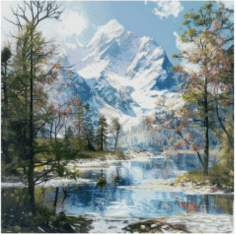 Diamond painting pattern image – reflective water in a calm lake, bordered by an autumn forest and in the background a majestic, snow-covered mountain under a cloudless sky.