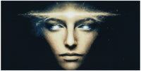 Thumbnail for Diamond painting model image - a face in the middle of a dark background, a bright glow on the forehead, and reflective eyes create a supernatural impression.