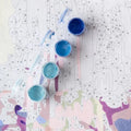 Thumbnail for Paint by numbers partially painted with open paint pots on top