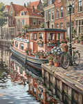 Thumbnail for Canal boat, bicycle, and flowers in the cityscape Paint By Numbers.