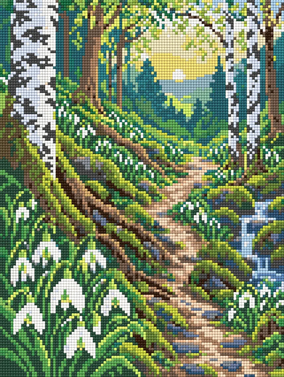 Diamond painting-motiv med en skogsstig med snödroppar, björkar och morgonsol