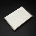 Thumbnail for Image of the protective sheet from the package against a dark background.
