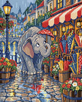 Miniatyrbild: En elefant bland paraplyer på en regnvåt kullerstensgata med gatlyktor