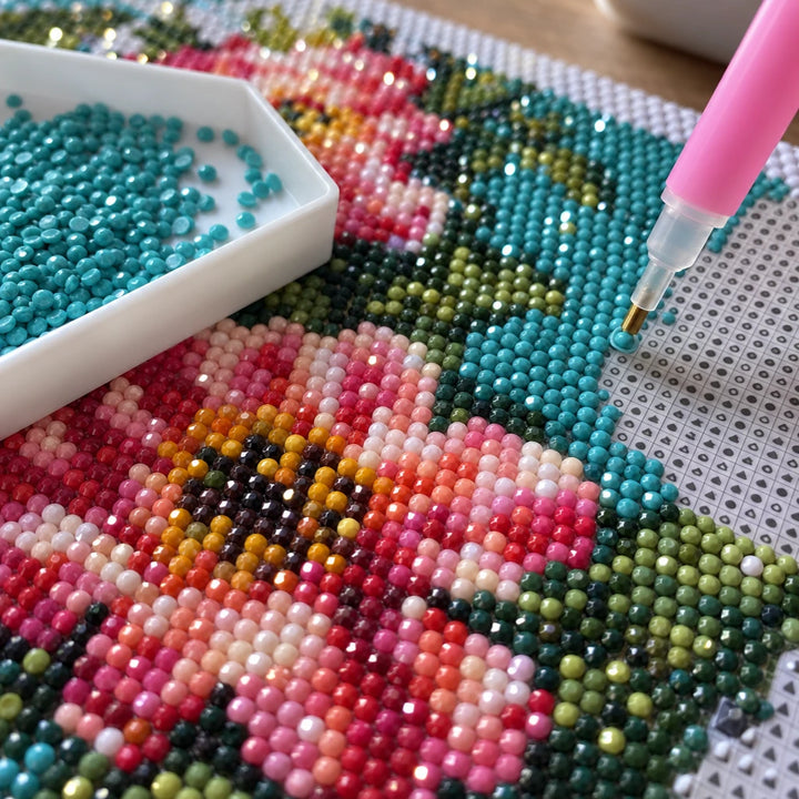 Acrylic drills on the canvas with a drill pen and a sorting tray