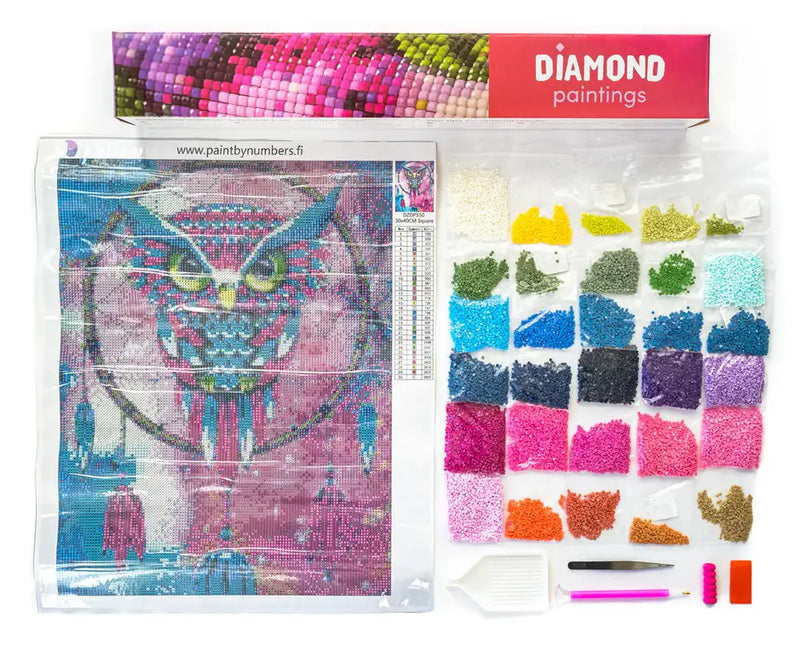 Diamond painting set with colorful diamonds, tweezers, tools, and an owl-themed painting canvas.