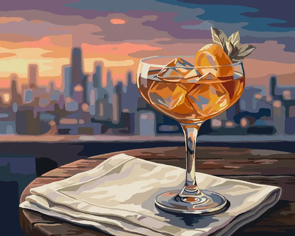 Cocktail glass in the foreground and a city skyline at sunset paint by numbers