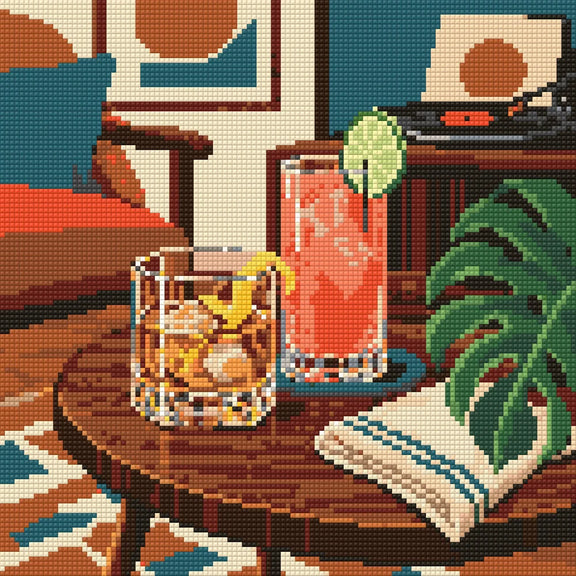 Diamond painting-motiv med cocktails och en bok på ett runt bord i ett rum med skivspelare