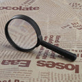 Thumbnail for magnifying glass on top of the newspaper