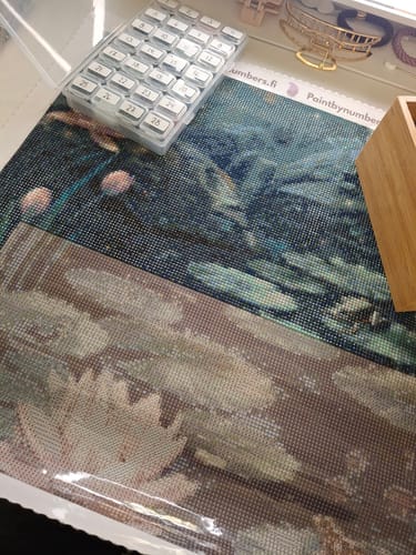 Finished Frog Lake diamond painting displayed in a customer home